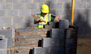 A construction worker building a residential property