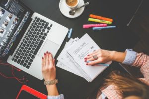 woman-working-at-her-office-desk_385-19323848